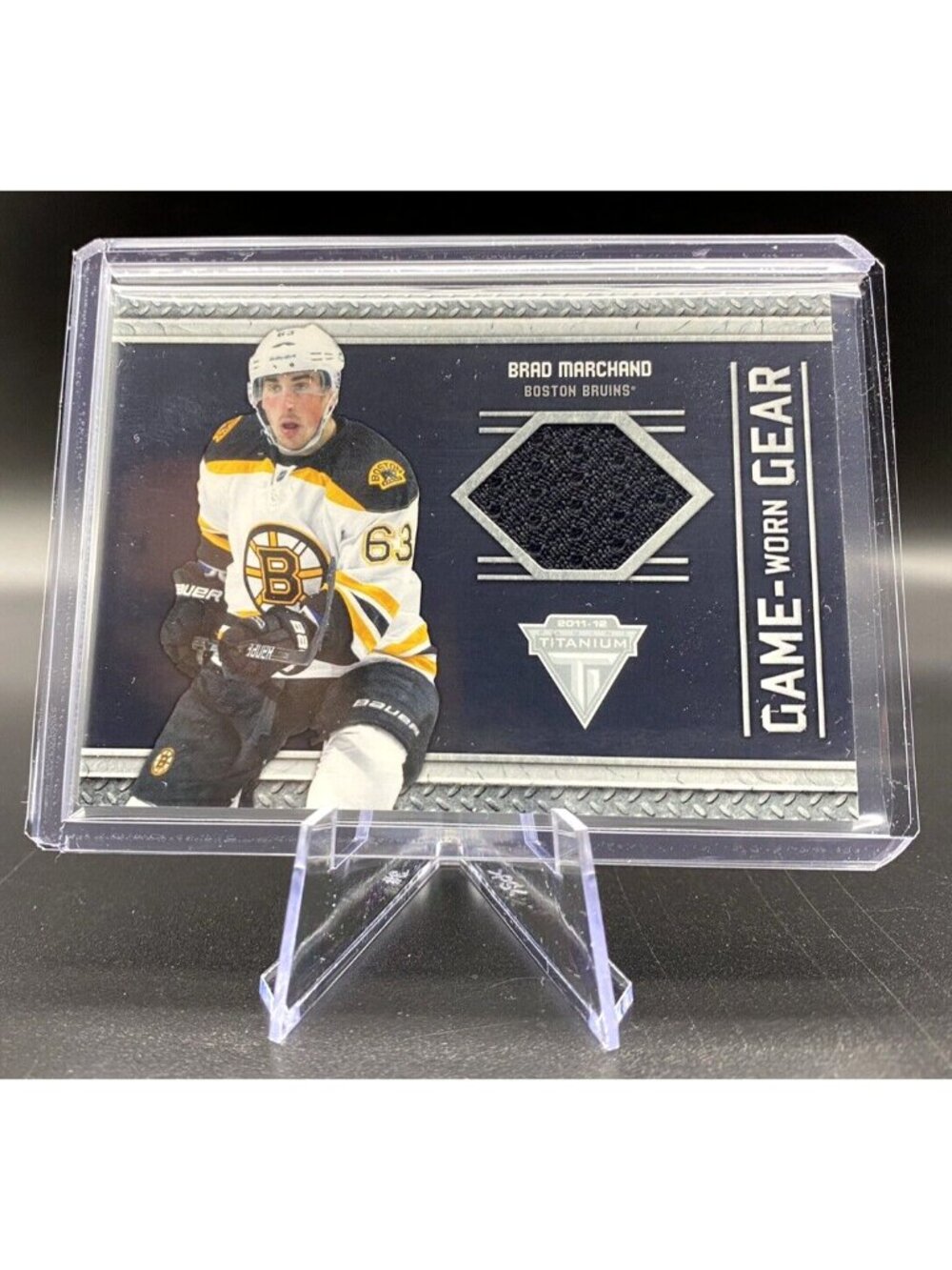 2011-12 Panini Titanium Brad Marchand Game Worn Gear #86 Boston Bruins